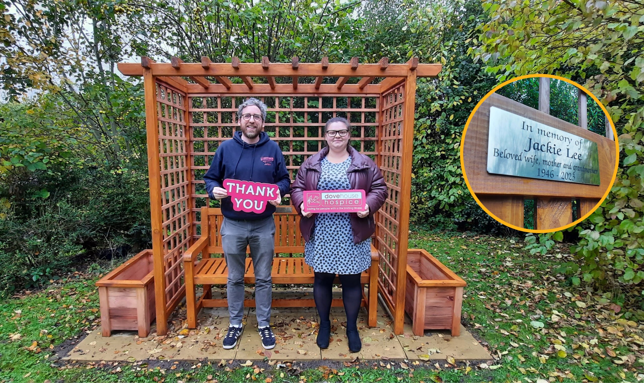 Community Impact: Two people stand in front of a newly built patio area of a garden with bench, arbour and planters. They hold a board that says thank you. A close up of the plague on the bench reads "In memory of Jackie Lee"
