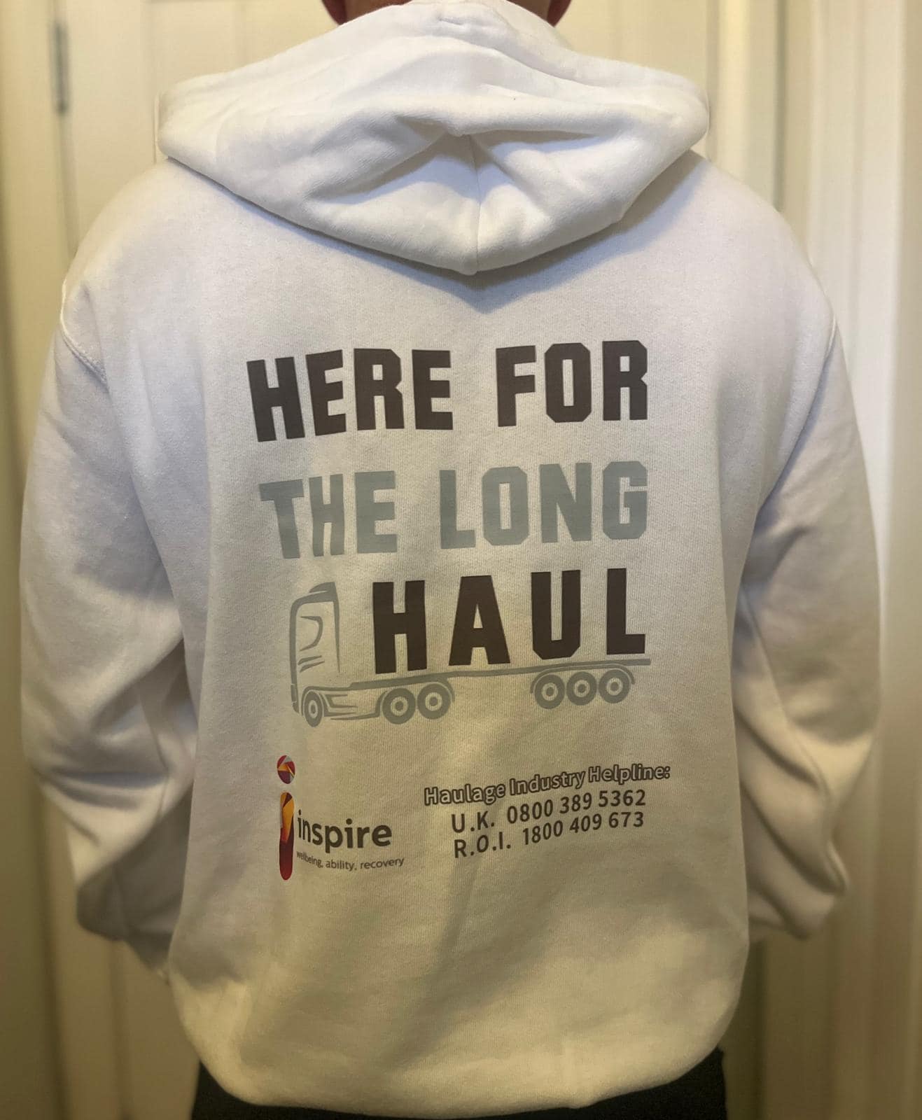 Breaker Breaker supporting truck drivers’ mental health Breaker Breaker supporting truck drivers' mental health sells promotional hoodies saying "Here for the long haul" on the back with details of the haulage industry helpline