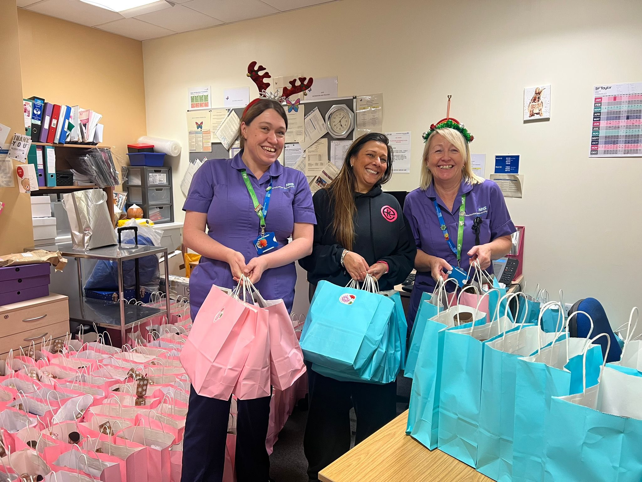 Emmies Kitchen Delivery Emmie's Kitchen handing gift bags to staff at Royal Manchester Children's Hospital