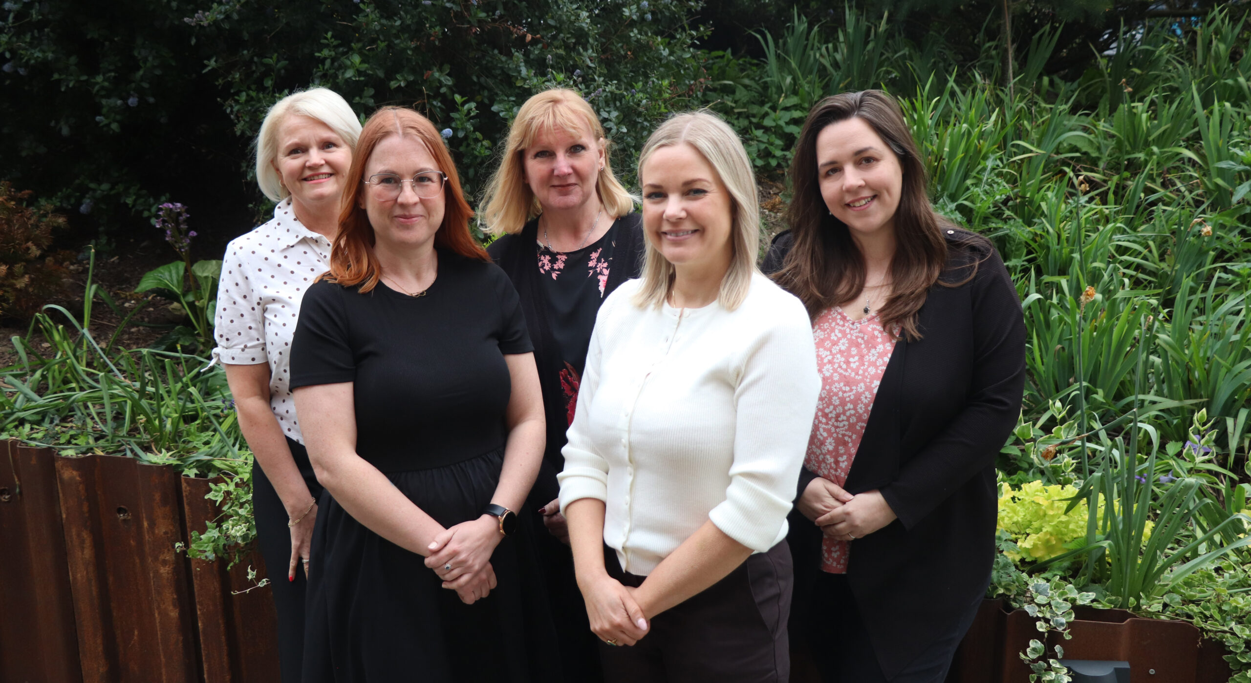 The Matthew Good Foundation Team photographed in the grounds at quarry house. Left to right: Vicky, Kirsty, Tracy, Kathryn, Jen