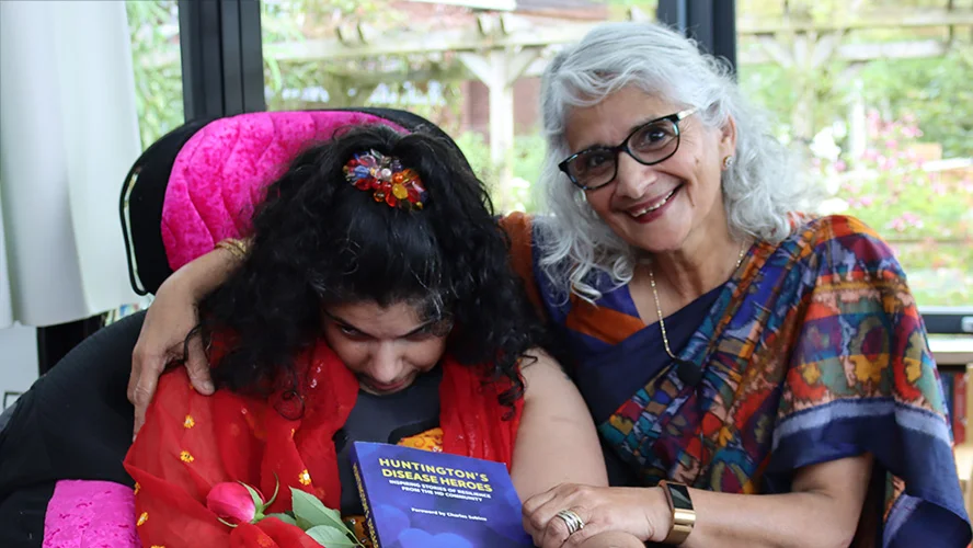Sheenam-and-Paramjit-970×546-1 Treetops Hospice nurse offering comfort and support to a patient receiving palliative care