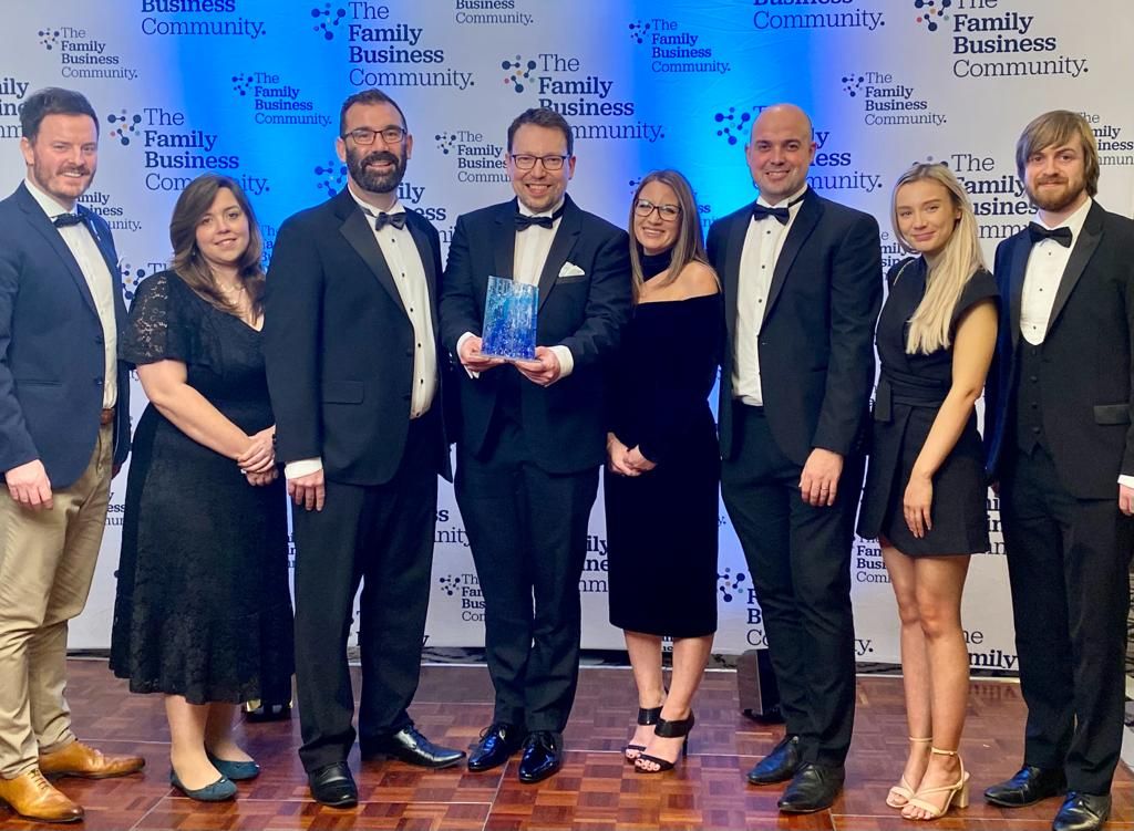 John Good Group collect the award for Best Social Impact at the Yorkshire & Humberside Family Business Awards 2022